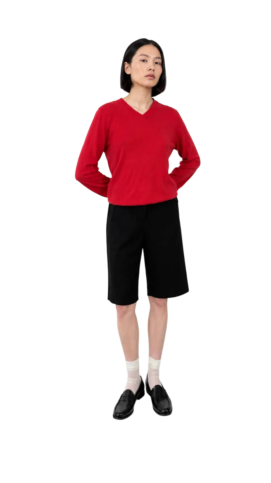 AI-generated model wearing a red sweater, black shorts and white socks